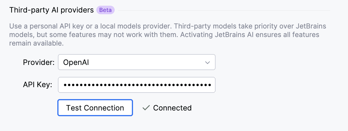 JetBrains AI Assistant Third-party AI providers settings with OpenAI selected, a masked API-key field, and a connected test result