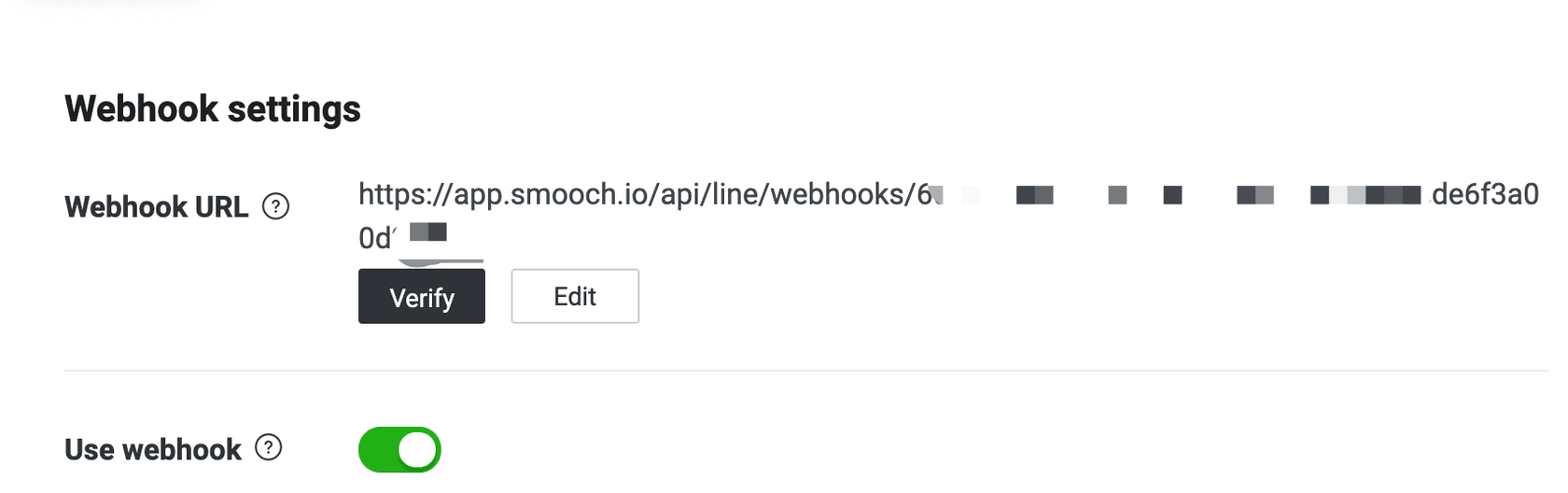 Smooch.io's webhook configuration for a LINE channel, displaying the webhook URL and activation toggle.