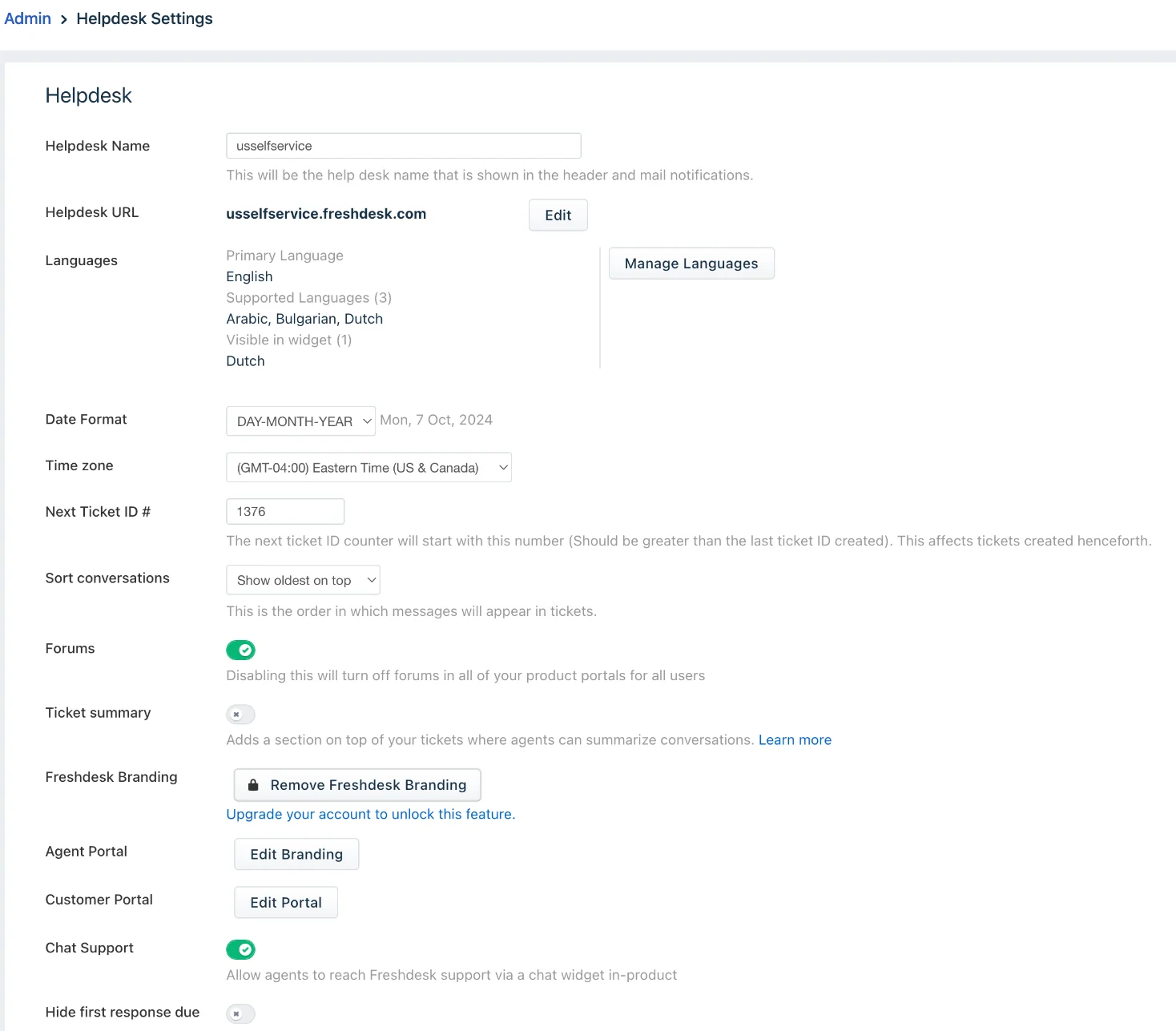 Freshdesk admin settings page showing helpdesk name, URL, supported languages, ticket ID counter and portal branding controls, as taken from Freshworks