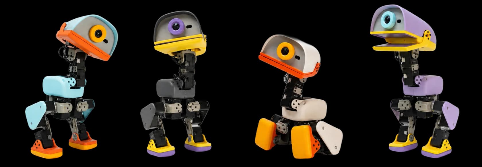 Four Microducks in the Cream, Graphite, Sky and Lavender colorways, shown in side profile, as taken from Pollen Robotics
