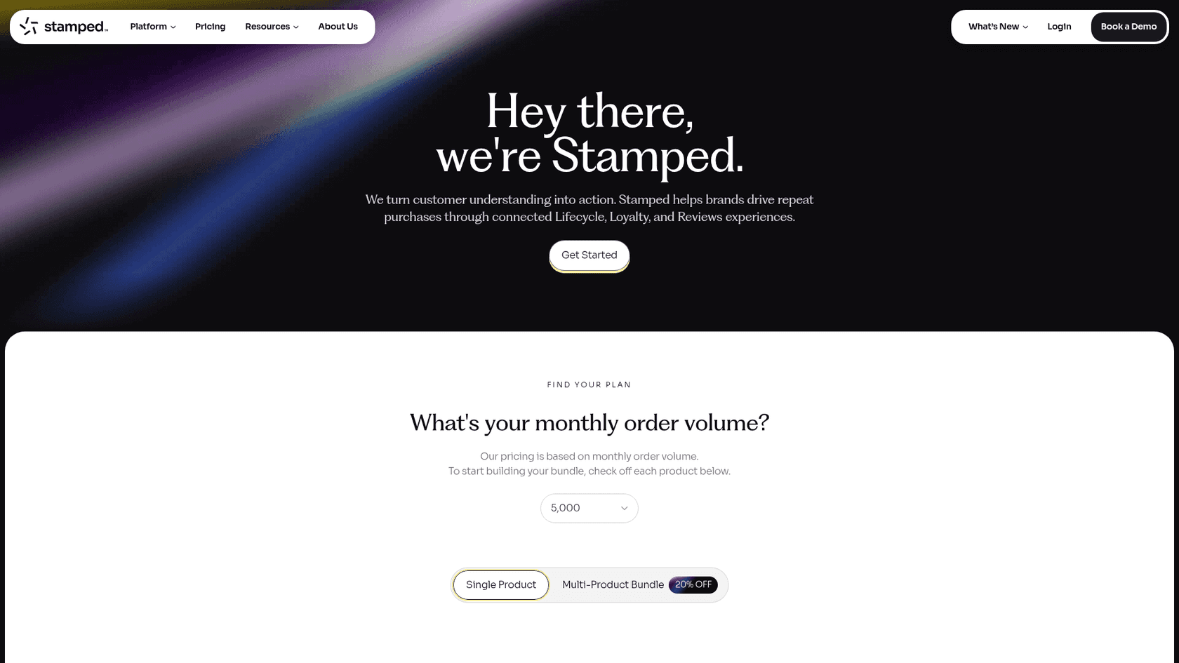 The Stamped pricing page showing Lifecycle, Loyalty and Reviews products with a monthly order volume selector