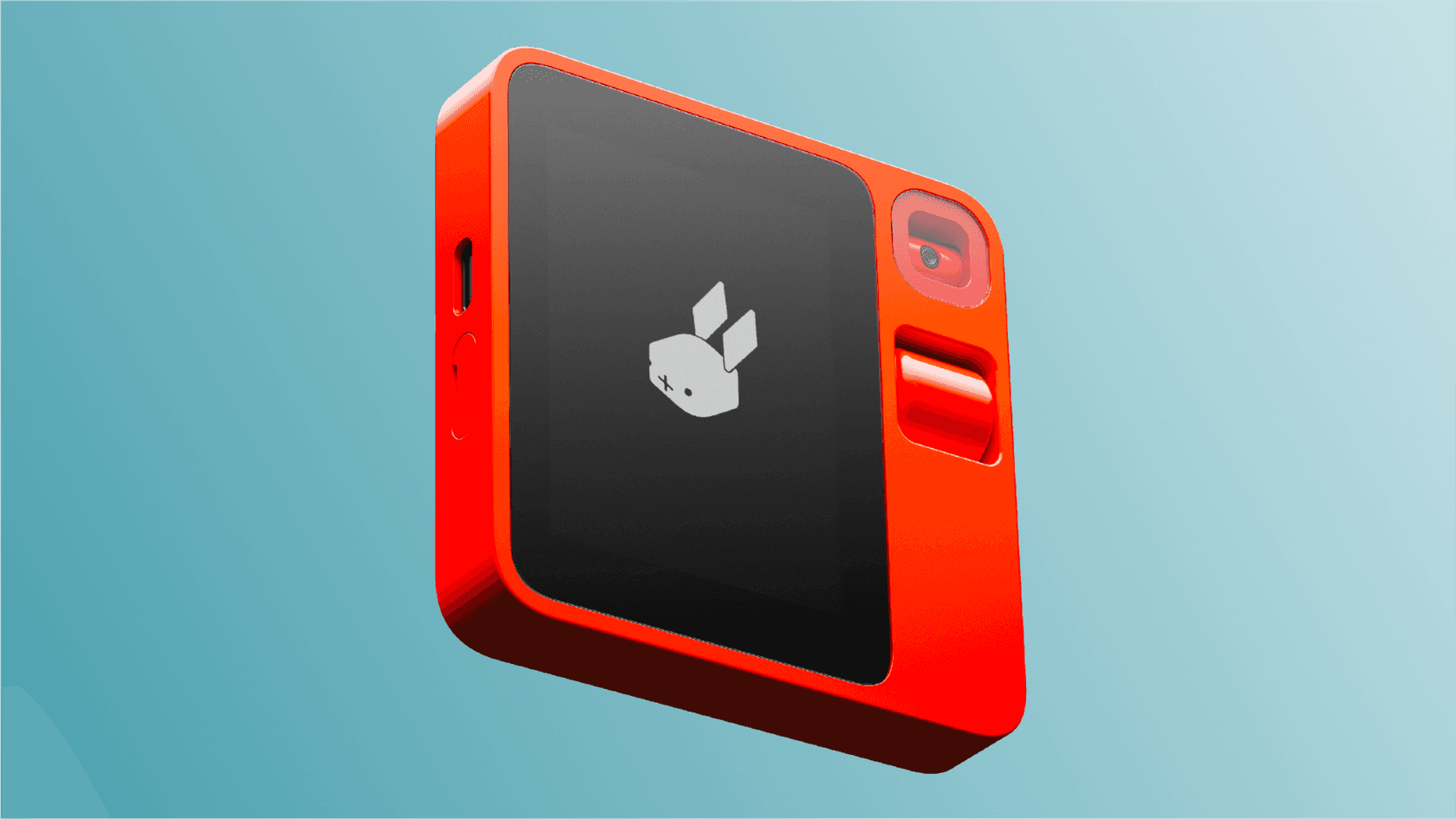 A close-up of the Rabbit AI R1, a small, square, orange AI-powered gadget.