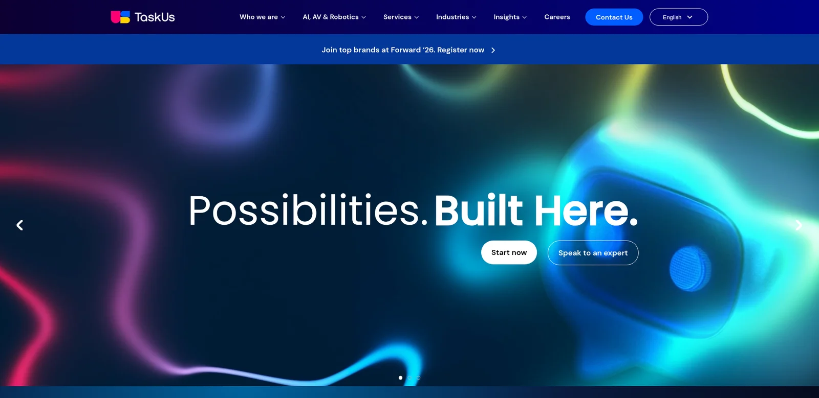 Página inicial da TaskUs: "Possibilities. Built Here." com os botões Start now e Speak to an expert, extraída da TaskUs